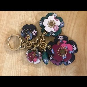 Sold:Coach tea rose bag charm